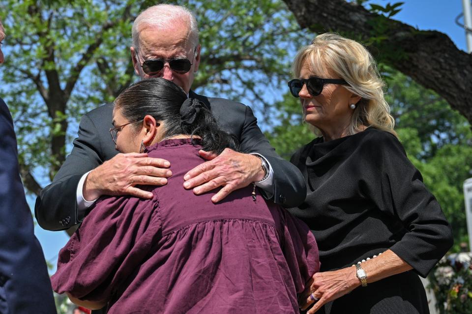 President Joe Biden embraces Mandy Gutierrez, the Priciple of Robb Elementary School, as he and First Lady Jill Biden in Uvalde, Texas.