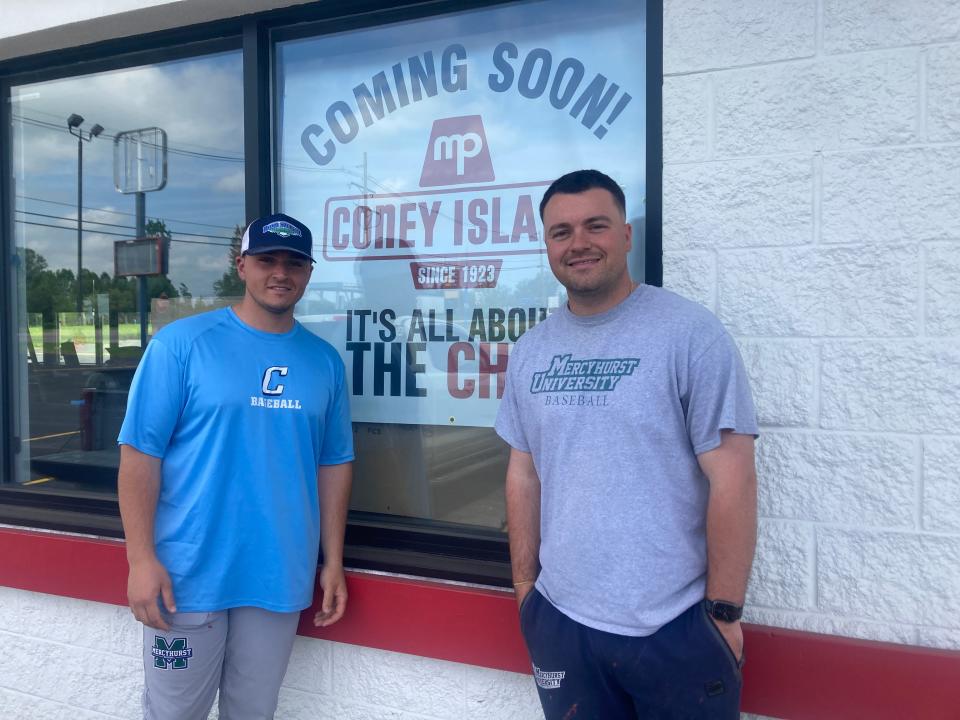 Anthony Santoro, at left, and Frank Fraschetti, stand outside the future home of MP Coney Island on Sterrettania Road near Interstate 90. The two are partners in the business.