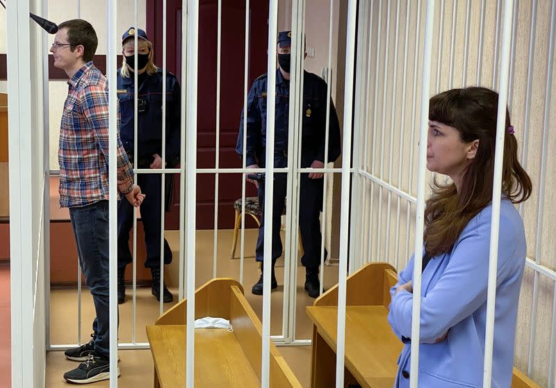 Journalist Katerina Borisevich and doctor Artyom Sorokin attend a court hearing in Minsk