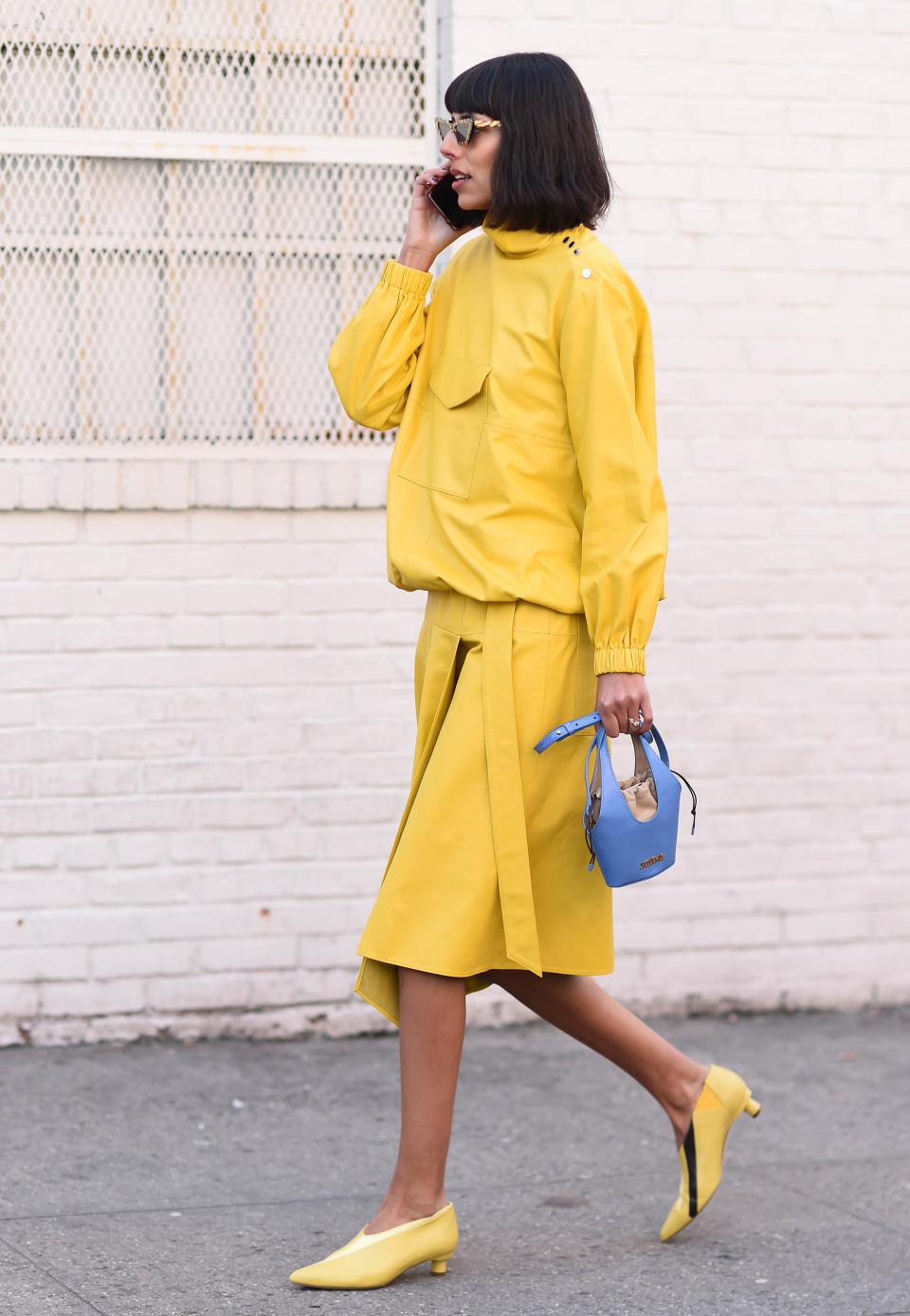 <p>Babba C Rivera wearing a yellow Tibi look during New York Fashion Week. <em>[Photo: Getty]</em> </p>