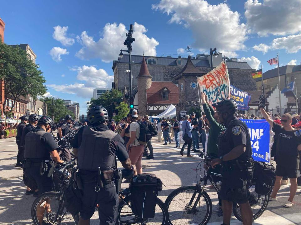 Police arrive at a hard security entry point at North King Drive and West Highland Avenue as conflicting groups gather on Wednesday, July 17, 2024.