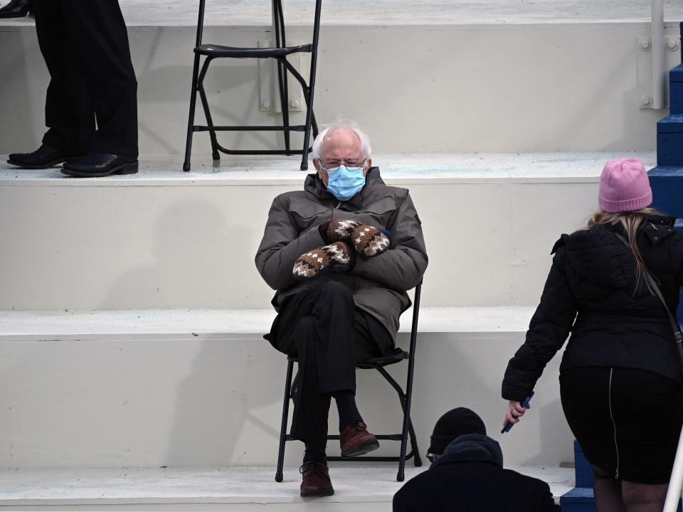 Former presidential candidate, Senator Bernie Sanders (D-Vermont) sits in the bleachers on Capitol Hill before Joe Biden is sworn in as the 46th US President on January 20, 2021, at the US Capitol in Washington, DC.