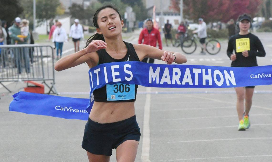 Yuzki Oey from Goleta, California,. finishes as the top female runner in the Full Marathon at the annual Two Cities Marathon, which started and finished at the Clovis Community College campus Sunday, Nov. 6, 2022, in Clovis.