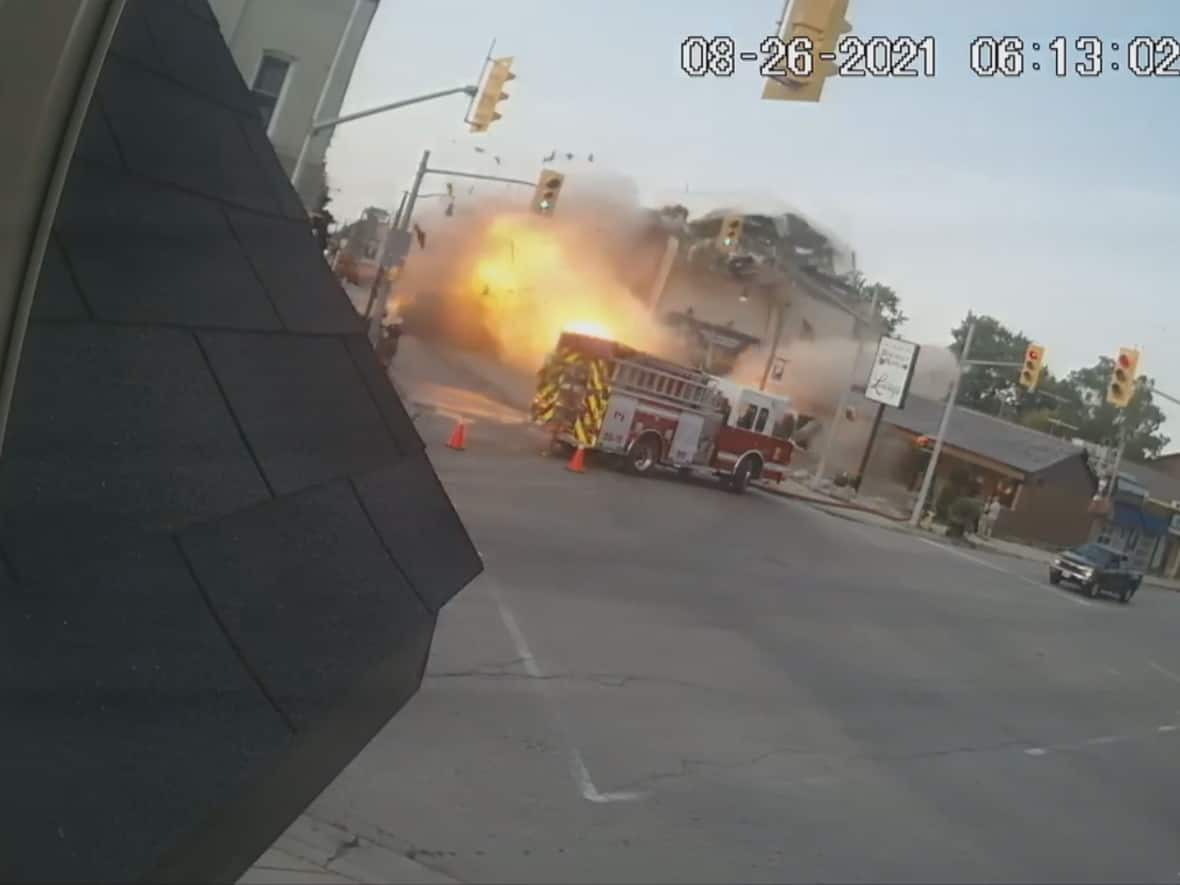 The Aug. 26, 2021, explosion in Wheatley, Ont., is shown in a screenshot from a security camera video. A Windsor law firm has filed a proposed class action lawsuit on behalf of people and businesses impacted by the explosion. (Courtesy John Urban - image credit)