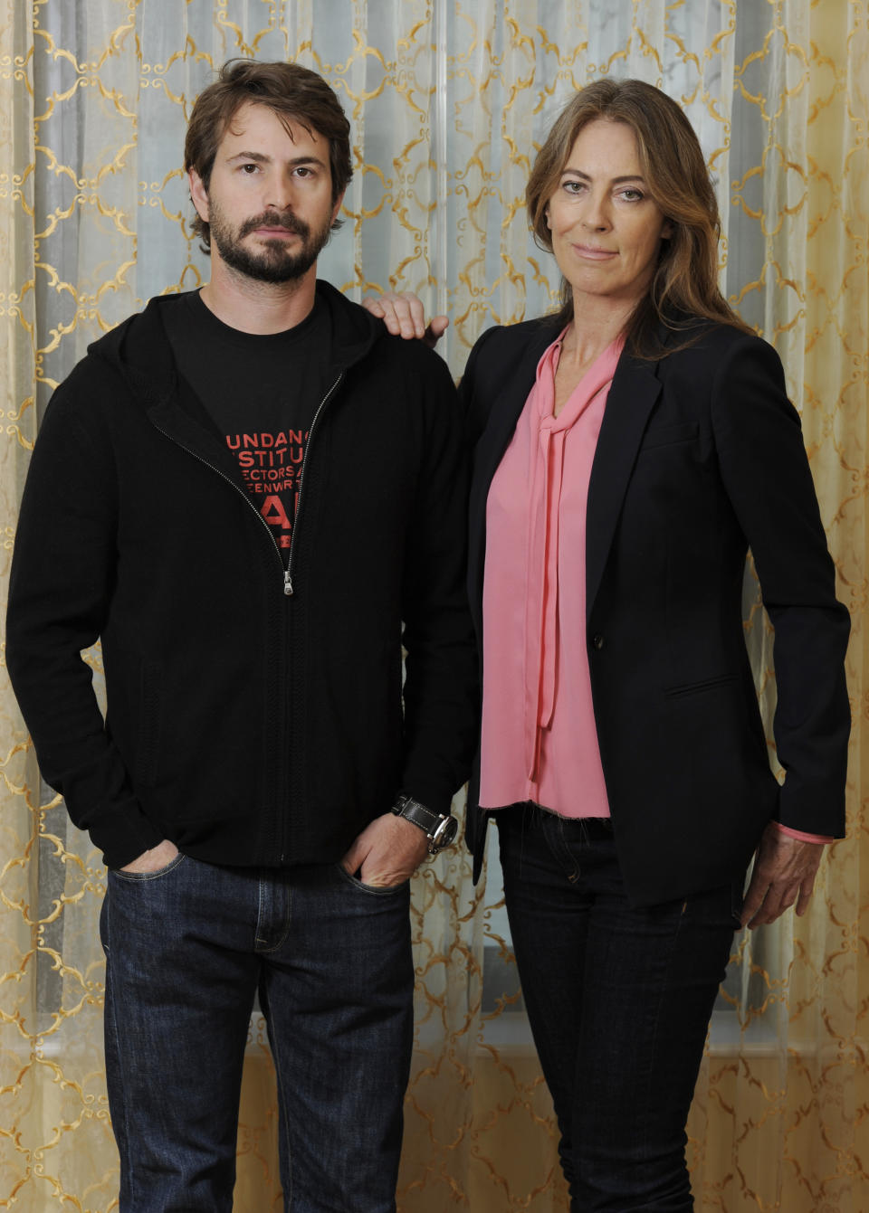 Mark Boal, left, screenwriter and co-producer of the film "Zero Dark Thirty," and the film's director and co-producer Kathryn Bigelow pose together for a portrait at the Beverly Wilshire Hotel on Monday, Dec. 10, 2012, in Beverly Hills, Calif. “Zero Dark Thirty,” which introduces itself as “based on first-hand accounts of actual events,” is new kind of timely fusing of filmmaking and journalism, what Bigelow calls “an imagistic version of living history.” (Photo by Chris Pizzello/Invision/AP)