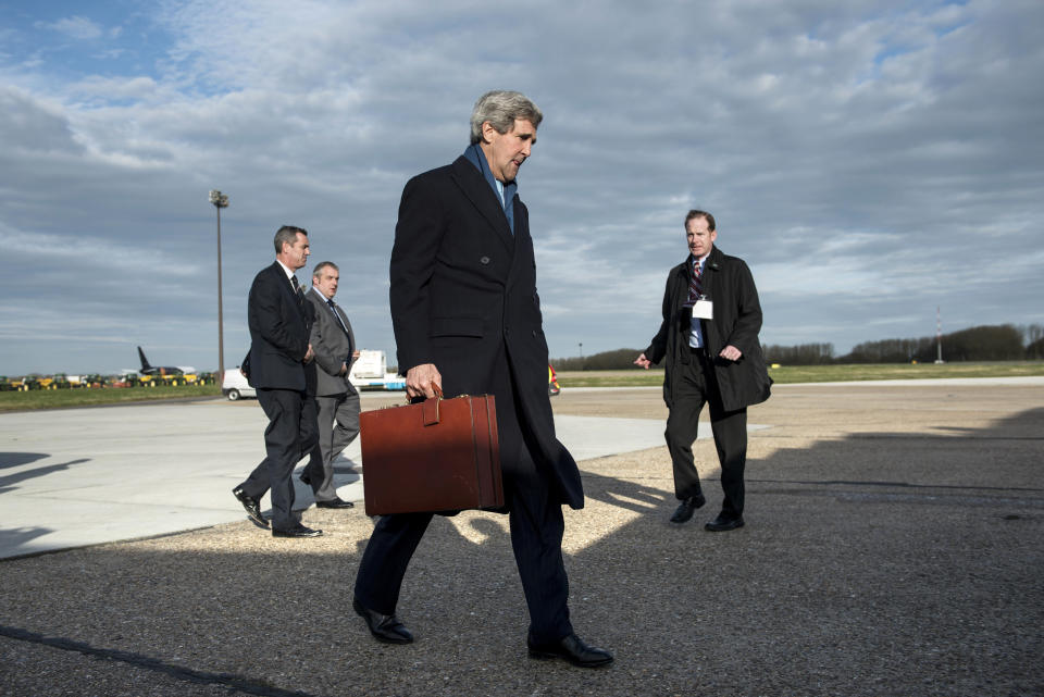 U.S. Secretary of State John Kerry boards his plane at London Stansted Airport, on March 15, 2014 in London. Kerry traveled to London to meet with Russian Foreign Minister Sergey Lavrov and others to discuss Russian envelopment in the Crimea. (Photo credit should read BRENDAN SMIALOWSKI/AFP/Getty Images)