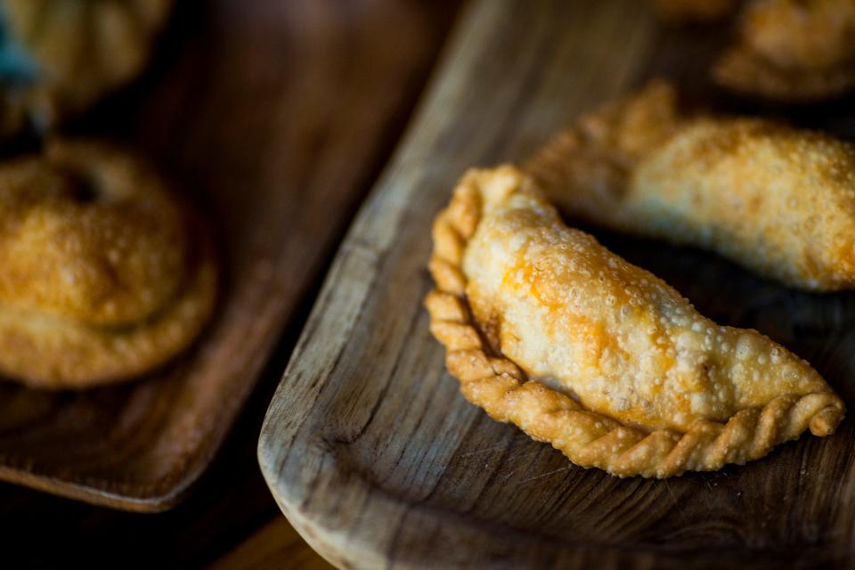 CheŽ is an Argentinian-owned and operated bar and restaurant on Walnut Street in Cincinnati that serves artisanal empanadas.