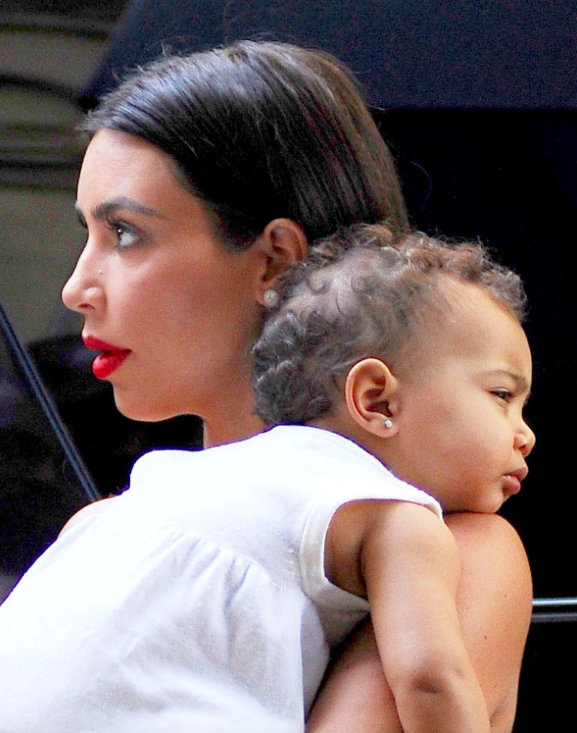 Kim Kardashian had North's ears pierced when she was a baby [Photo: Rex]