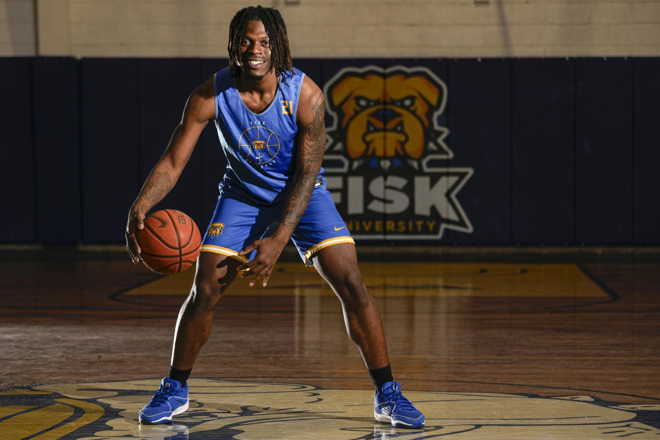 Fisk University basketball player Jeremiah Armstead poses for a portrait Wednesday, March 6, 2024, in Nashville, Tenn. The formerly homeless Armstead will receive the U.S. Basketball Writers Association 2024 Perry Wallace Most Courageous award at the NCAA Final Four basketball tournament. (AP Photo/George Walker IV)