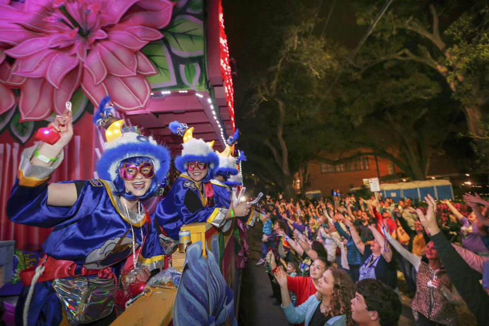 The Mystic Krewe of Nyx parade makes its way through the streets during Mardi Gras celebrations in New Orleans, Wednesday, Feb. 19, 2020. (AP Photo/Brett Duke)