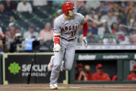 Batting second in the line up and also the starting pitcher, Los Angeles Angels Shohei Ohtani (17) flips his bat as he grounds out during the first inning of a baseball game against the Houston Astros Tuesday, May 11, 2021, in Houston. (AP Photo/Michael Wyke)