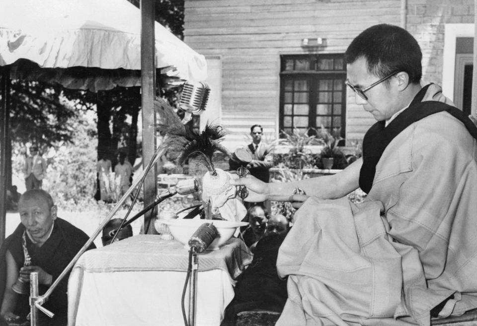 Dalai Lama sits&nbsp;under a canopy in Mussoorie, India, as he celebrates the birthday of Buddha.&nbsp;