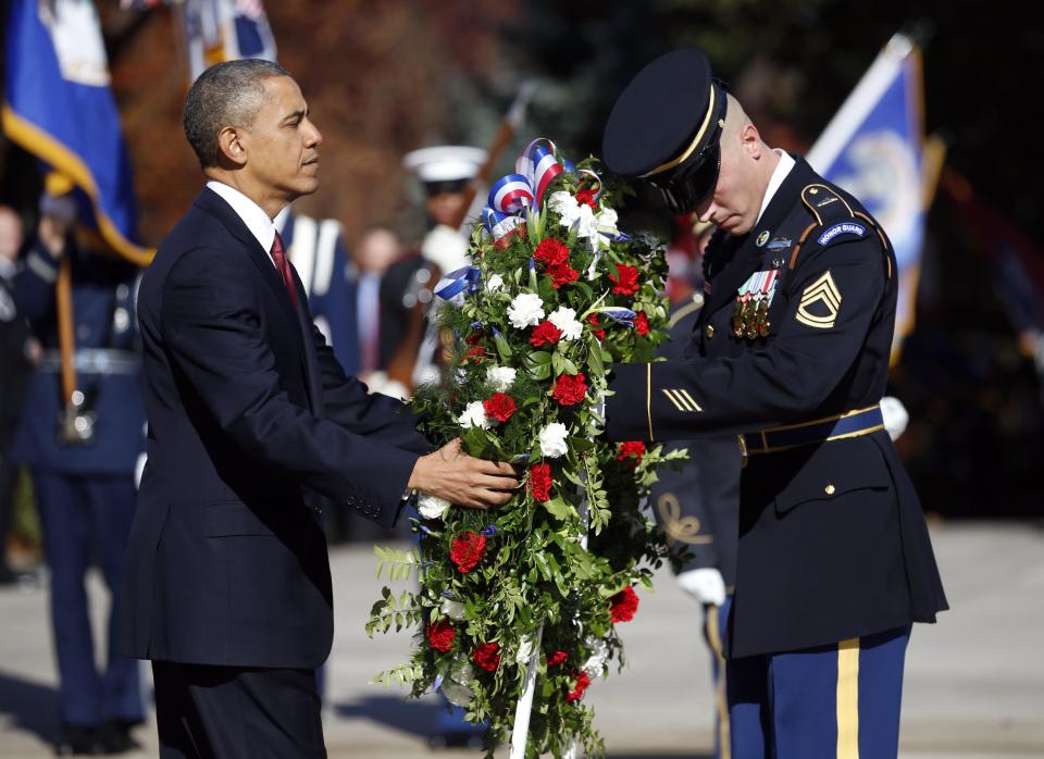 U.S. President Obama lays a wreath at the Tomb of the Unknowns on Veterans Day at Arlington National Cemetery in Washington