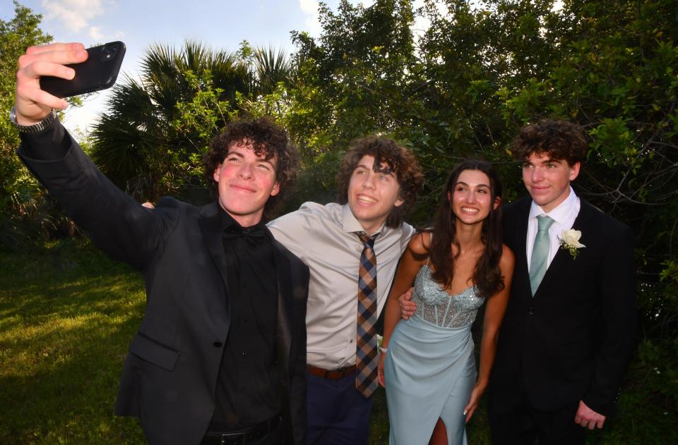 It’s prom season in Brevard and prom night is a night of selfies. Here, Trey Pope takes a pre-prom selfie with his buddy Jackson Reyier, his brother Ty Pope and Ty's date, Ella Hovan at the Viera Wetlands on April 20.