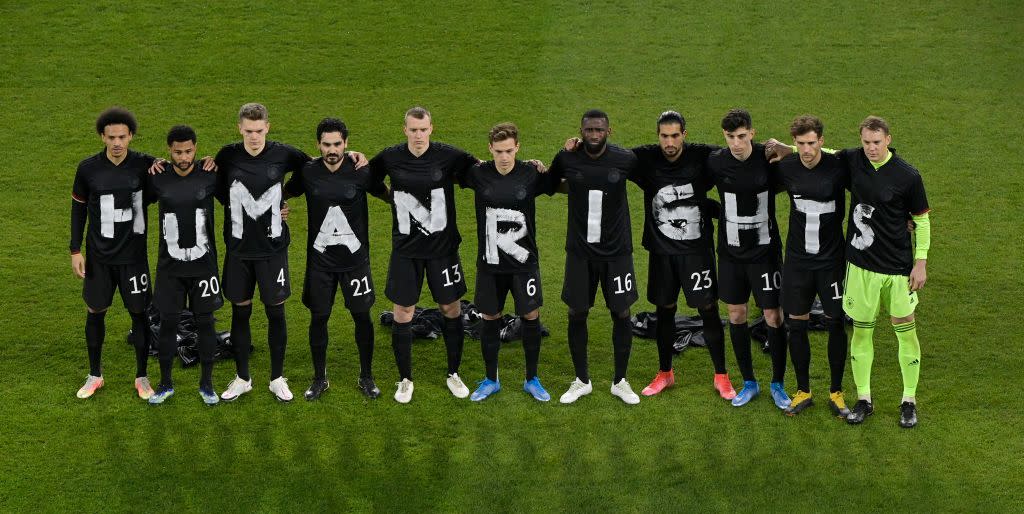 duisburg, germany   march 25 players of germany wear t shirts which spell out human rights prior to the fifa world cup 2022 qatar qualifying match between germany and iceland on march 25, 2021 in duisburg, germany sporting stadiums around germany remain under strict restrictions due to the coronavirus pandemic as government social distancing laws prohibit fans inside venues resulting in games being played behind closed doors photo by tobias schwarz   poolgetty images