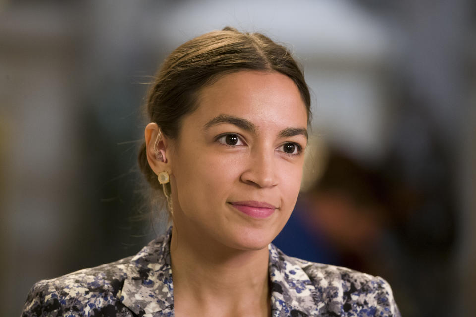 Rep. Alexandria Ocasio-Cortez, D-N.Y., prepares to do a television interview on Capitol Hill, Thursday, June 27, 2019 in Washington. (AP Photo/Alex Brandon)