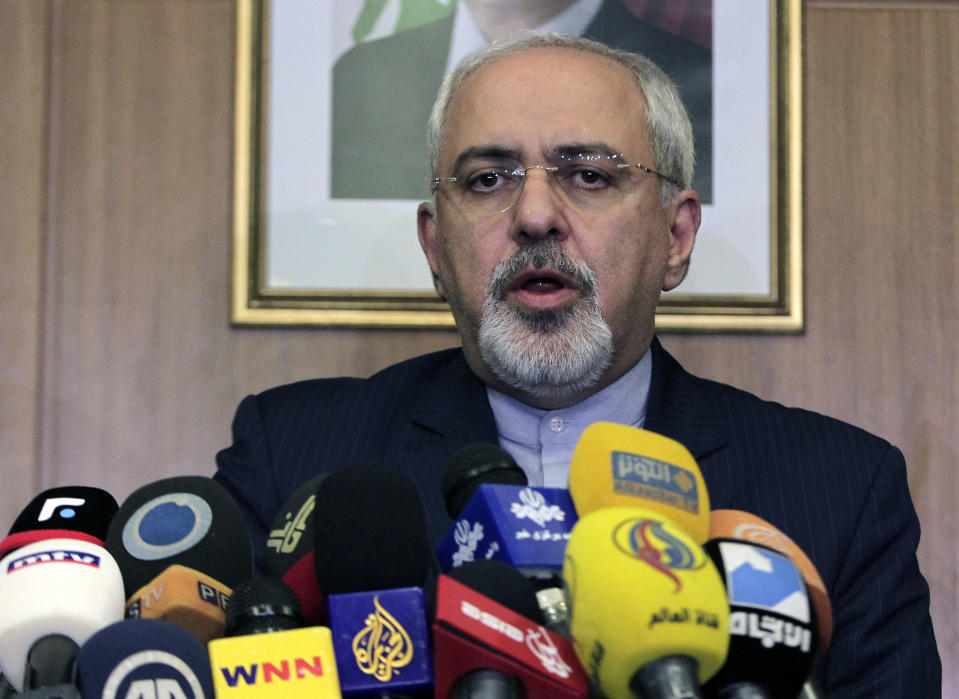 Iranian Foreign Minister Mohammad Javad Zarif speaks during a press conference at Rafik Hariri International Airport in Beirut, Lebanon, Sunday, Jan. 12, 2014. Zarif is in Beirut to meet with Lebanese officials. (AP Photo/Bilal Hussein)