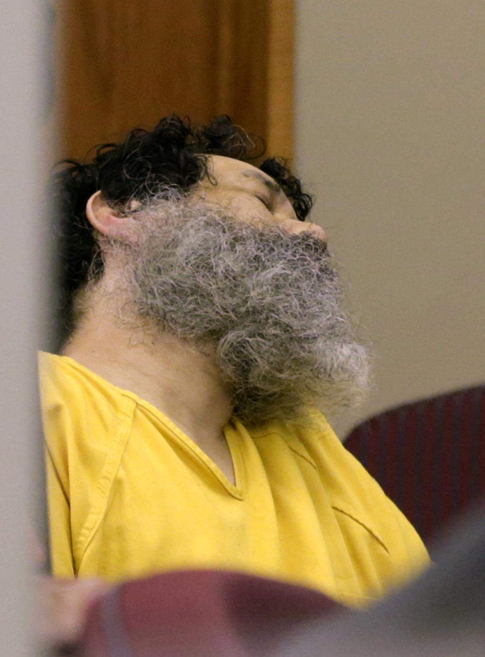 Anthony Garcia slumps in his chair at the Douglas County Court in Omaha, Neb., Friday, Sept. 14, 2018. The former doctor convicted in the revenge killings of four people connected to a Nebraska medical school was sentenced by a three-judge panel to death. Garcia was convicted in two attacks that occurred five years apart. The first victims were the son and housekeeper of a faculty member at Creighton University School of Medicine in Omaha, where Garcia once worked. Garcia also was found guilty in the 2013 deaths of another Creighton pathology doctor and his wife. (AP Photo/Nati Harnik)