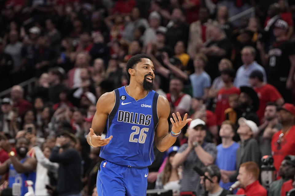 Dallas Mavericks' Spencer Dinwiddie reacts after making a basket during the closing seconds against the Houston Rockets in the second half of an NBA basketball game Monday, Jan. 2, 2023, in Houston. Dallas won 111-106. (AP Photo/David J. Phillip)