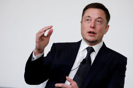 FILE PHOTO: Elon Musk, founder, CEO and lead designer at SpaceX and co-founder of Tesla, speaks at the International Space Station Research and Development Conference in Washington, U.S., July 19, 2017. REUTERS/Aaron P. Bernstein/File Photo