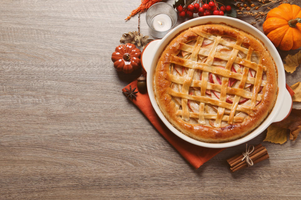 A pie with a lattice top on a plate