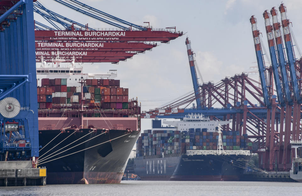 15 June 2020, Hamburg: The container freighter "Al Jasrah" (l) and the container freighter "Alexander von Humboldt" are unloaded at Terminal Burchardkai (l) and at Eurogate (r) Hamburg's exports fell sharply in the first three months of the year. Compared with the same period last year, exports fell by 14.1 per cent to 10.5 billion euros, the Statistics Office North announced in the Hanseatic City on 16 June 2020. Photo: Axel Heimken/dpa (Photo by Axel Heimken/picture alliance via Getty Images)