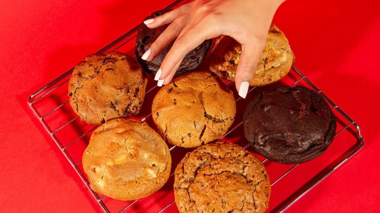 hand selecting Bang Cookies