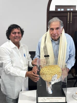 Mr. Ratan Naval Tata, Chairman Emeritus, Tata Sons, receiving the prestigious KISS Humanitarian Award 2021 from Prof. Achyuta Samanta, Founder, KIIT, KISS & KIMS, Bhubaneswar.