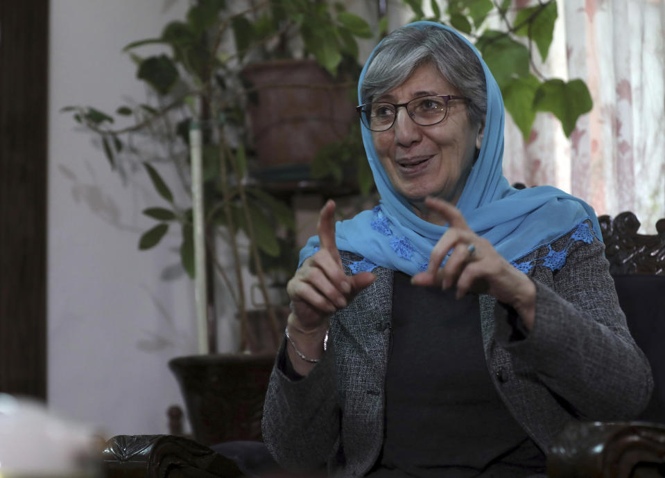 FILE - in this Saturday, March 6, 2021, Sima Samar, a prominent activist and physician who has been fighting for women's rights in Afghanistan for the past 40 years, gives an interview at her house in Kabul, Afghanistan. An Afghan education ministry memo banning girls, 12 years old and older, from singing at public school functions, which the education ministry tells The Associated Press was a mistake, is causing a social media stir. (AP Photo/Rahmat Gul, File)