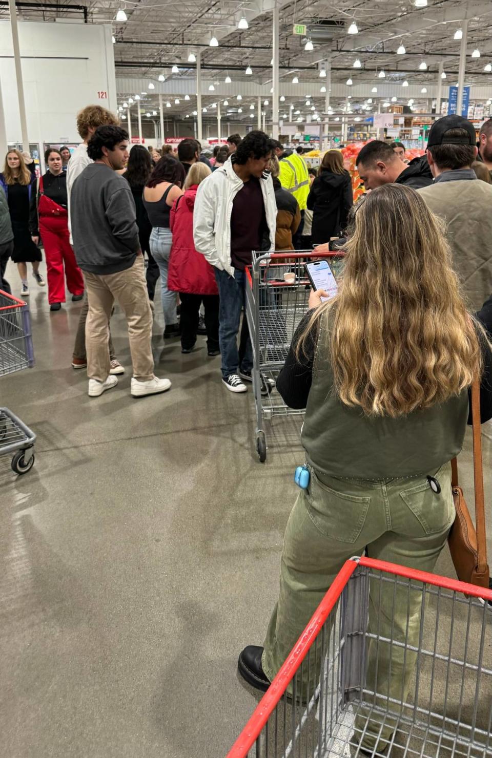 The line to get Guy Fieri to autograph his bottle of Santa Spirit tequila at Costco stretched all around the store all the way to the back past the frozen food section.