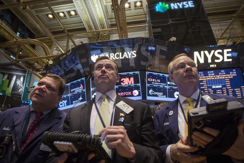 Traders work on the floor of the New York Stock Exchange April 8, 2014. REUTERS/Brendan McDermid