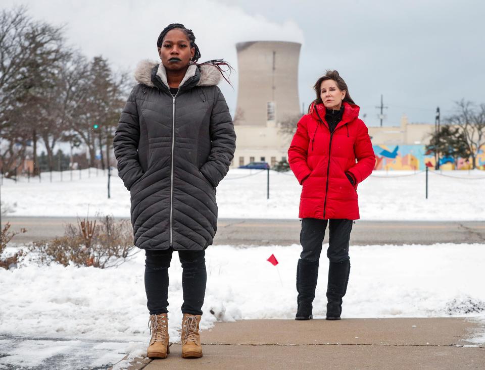 Just Transition NWI leaders La'Tonya Troutman, left, and Susan Thomas, right, pose for a photo outside of the Michigan City Planning Department on Tuesday, Jan. 27, 2021 in downtown Michigan City. 