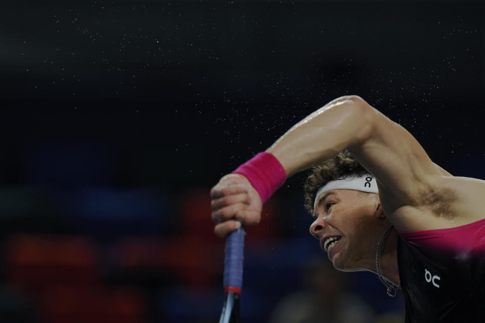 Ben Shelton of the United States serves against his compatriot Sebastian Korda during the men's singles quarterfinal match in the Shanghai Masters tennis tournament at Qizhong Forest Sports City Tennis Center in Shanghai, China, Thursday, Oct. 12, 2023. (AP Photo/Andy Wong)