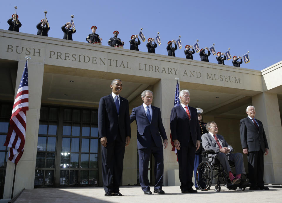 From left, President Barack Obama, former president George W. Bush, former president William J. Clinton former President George H.W. Bush and former president Jimmy Carter arrive for the dedication of the George W. Bush presidential library on Thursday, April 25, 2013, in Dallas. (AP Photo/David J. Phillip)