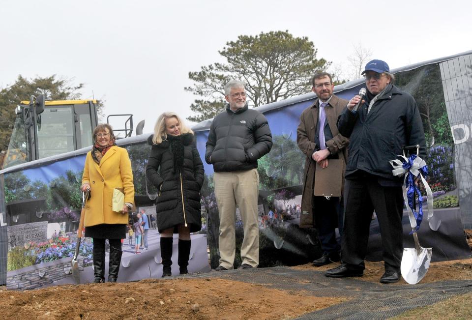 Josiah Lilly IV, right, holds onto a shovel that his father, Josiah Lilly III, and mother Josephine Lilly used during the groundbreaking for Heritage Museums & Gardens 66 years ago. The Lilly family are the founders of Heritage Museums and Gardens, which held a press conference Wednesday announcing a donation from Peter and Pamela Barbey to be used for a new welcome center. The Barbey Family Welcome Center will be built on the Sandwich property. 
To see more photos, go to www.capecodtimes.com.