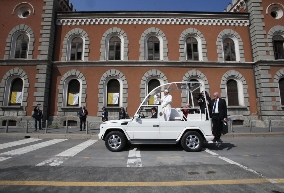 Pope Francis arrives at Milan’s San Vittore penitentiary as part of his one-day pastoral visit to Monza and Milan, Italy’s second-largest city, Saturday, March 25, 2017. Pope Francis began his one-day visit Saturday to the world's largest diocese which included a stop at the city's main prison as well as a blessing at the Gothic-era Duomo cathedral. (AP Photo/Antonio Calanni)