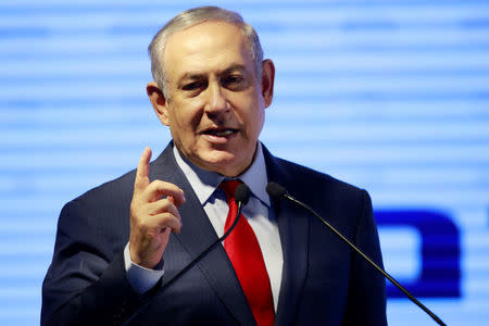 Israeli Prime Minister Benjamin Netanyahu gestures as he speaks during an inauguration ceremony for a fortified emergency room at the Barzilai Medical Center in Ashkelon, southern Israel, February 20, 2018. REUTERS/Amir Cohen