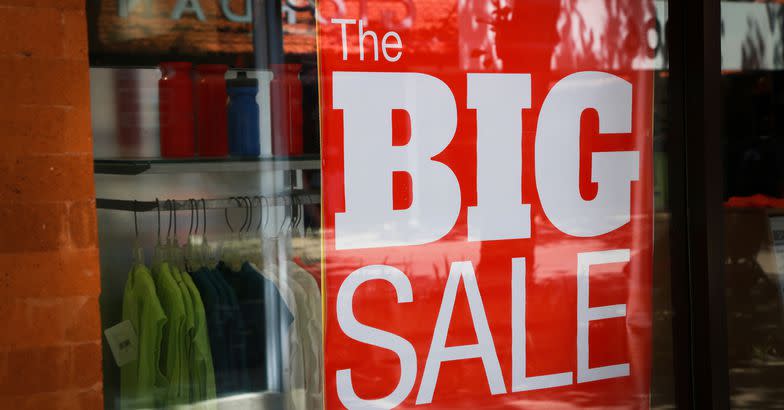 'The Big Sale' sign in store window