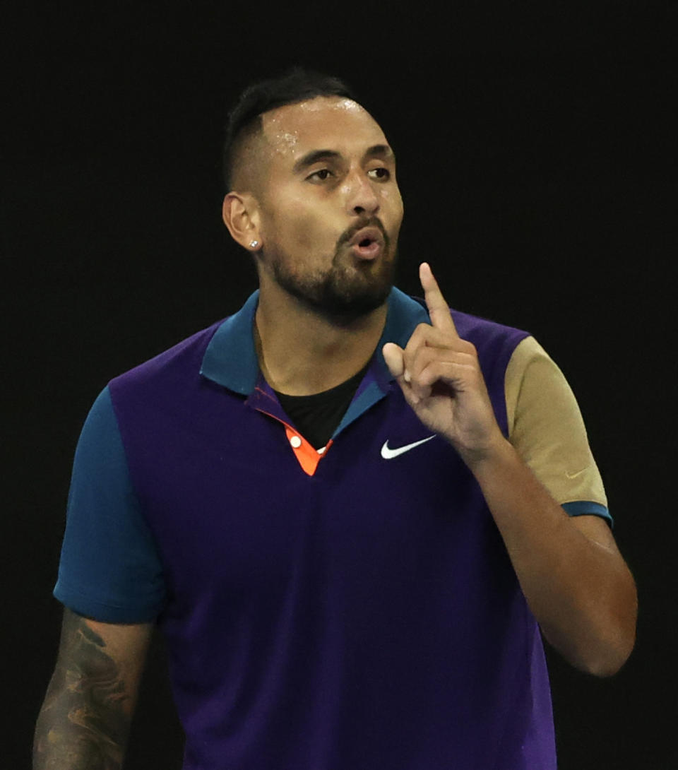 Australia's Nick Kyrgios celebrates during his third round match against Austria's Dominic Thiem at the Australian Open tennis championship in Melbourne, Australia, Friday, Feb. 12, 2021.(AP Photo/Hamish Blair)