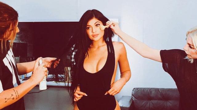 Kylie Jenner attempted to beat her critics to the punch when she shared via Instagram that she has packed on a few pounds. <strong> PHOTOS: Kylie Jenner Had a Seriously Scantily Clad Coachella </strong> The 17-year-old reality star posted yet another scantily-clad shot of herself on Saturday that showed her wearing a low-cut swimsuit and thigh-high shoes as she got her hair and makeup done. While she captioned the photo "behind the scenes," Kylie later added: "Yes I gained weight. There, I said it so u don't have to (sic)." <strong> VIDEO: Kylie Jenner Finally Reveals the Truth About Her Lips </strong> Regardless of her alleged weight gain, she still stunned in her Balmain mini-dress at the 2015 Billboard Music Awards. Despite their stand-out styles, Kylie and her 19-year-old sister Kendall Jenner were not so well-received when they hit the awards show stage on Sunday. Upon introducing their brother-in-law Kanye West, the <em> Keeping Up with the Kardashians </em>siblings were booed. <strong>Do you think Kylie has gained weight? </strong>