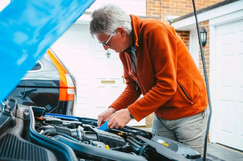 Man checking his engine