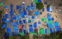 <p>Aerial view of tents for displaced and homeless earthquake victims in Sigar Penjalin village, North Lombok, Indonesia, Aug. 10, 2018. (Photo: Antara Foto/Ahmad Subaid via Reuters) </p>