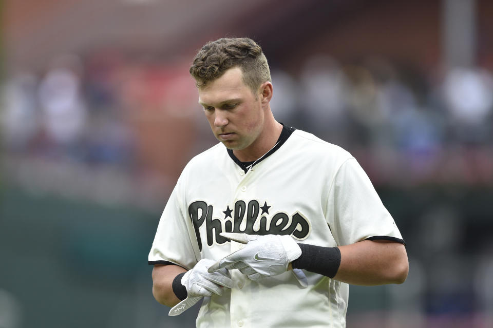 Phillies OF Rhys Hoskins fouled a Kenley Jansen fastball off his own face before spitting up blood and leaving the game on Monday. (AP)