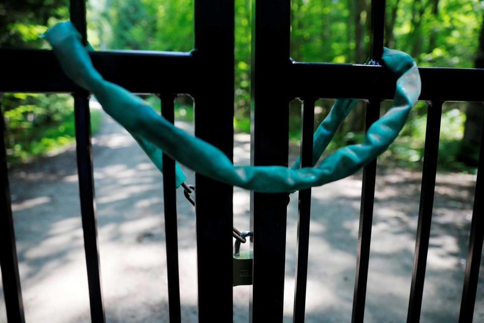 A locked gate blocked the driveway to the property where Ghislaine Maxwell was residing (REUTERS)