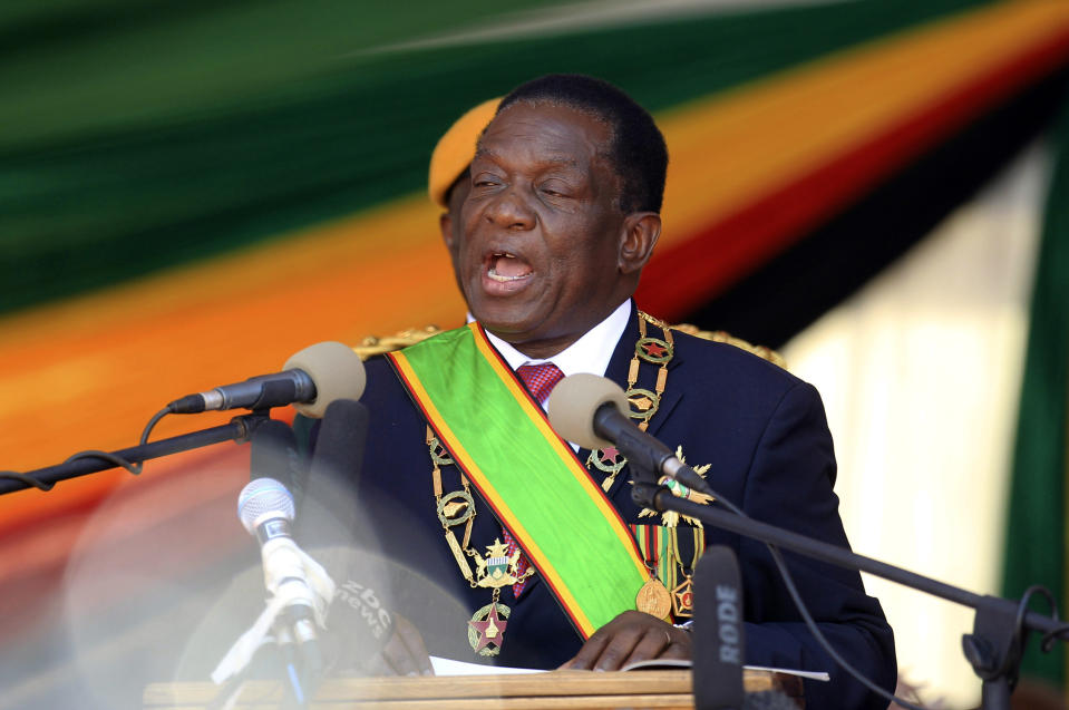 Zimbabwean President Emmerson Mnangagwa delivers his speech during his inauguration ceremony at the National Sports Stadium in Harare, Sunday, Aug. 26, 2018. Zimbabwe on Sunday inaugurated a president for the second time in nine months as a country recently jubilant over the fall of longtime leader Robert Mugabe is now largely subdued by renewed harassment of the opposition and a bitterly disputed election. (AP Photo/Tsvangirayi Mukwazhi)