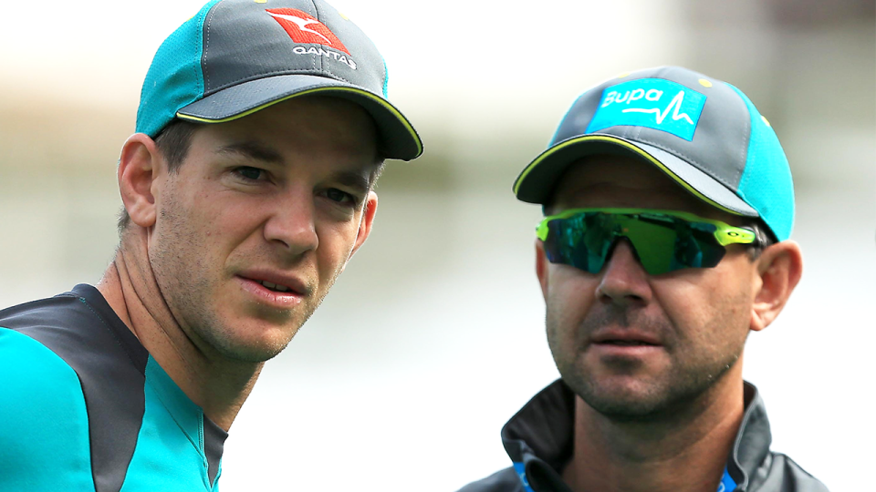 Ricky Ponting (pictured right) talking to Tim Paine (pictured left) during an Aussie cricket training session.