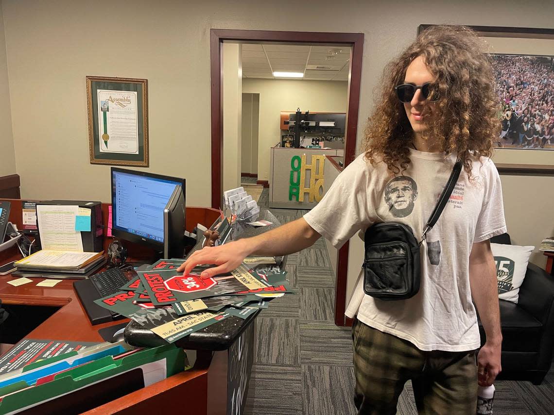 A Sacramento State student leaving a flier in opposition of the California State University’s tuition hike in the university’s President’s Office on April 4, 2024. Sacramento State organized a protest in opposition to the tuition hike, saying its inequitable and makes college unaffordable.