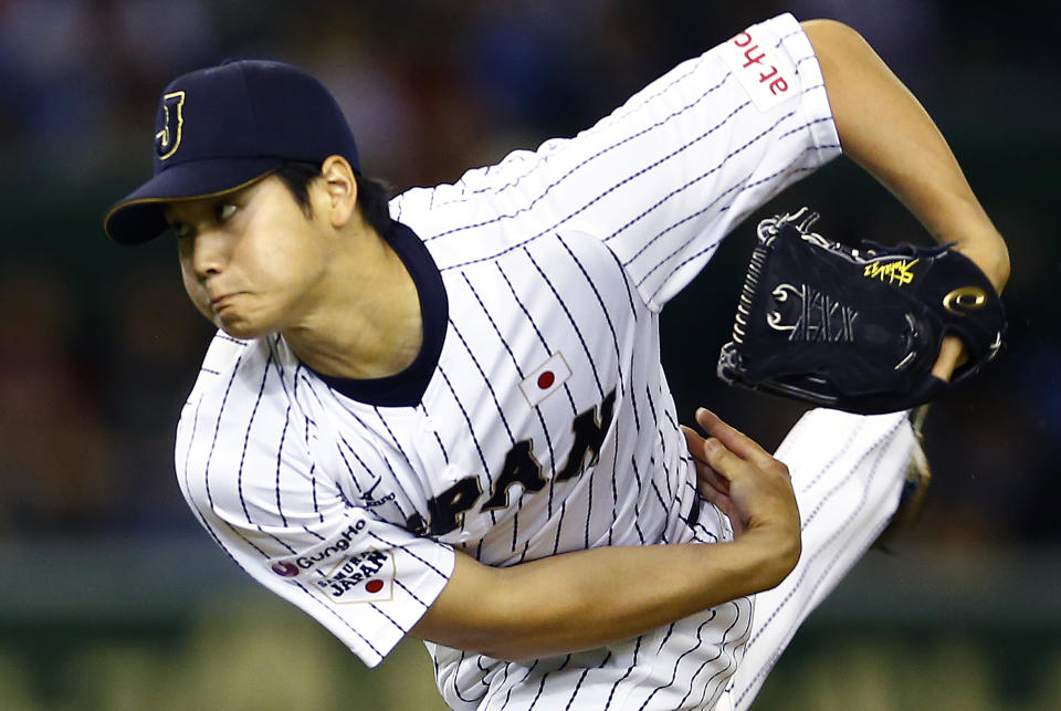 In this Nov. 19, 2015, file photo, Japan’s starter Shohei Otani pitches against South Korea. (AP)