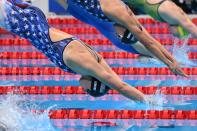 <p>USA's Kathleen Ledecky (bottom) competes in the final of the women's 800m freestyle swimming event during the Tokyo 2020 Olympic Games at the Tokyo Aquatics Centre in Tokyo on July 31, 2021. (Photo by Oli SCARFF / AFP)</p> 