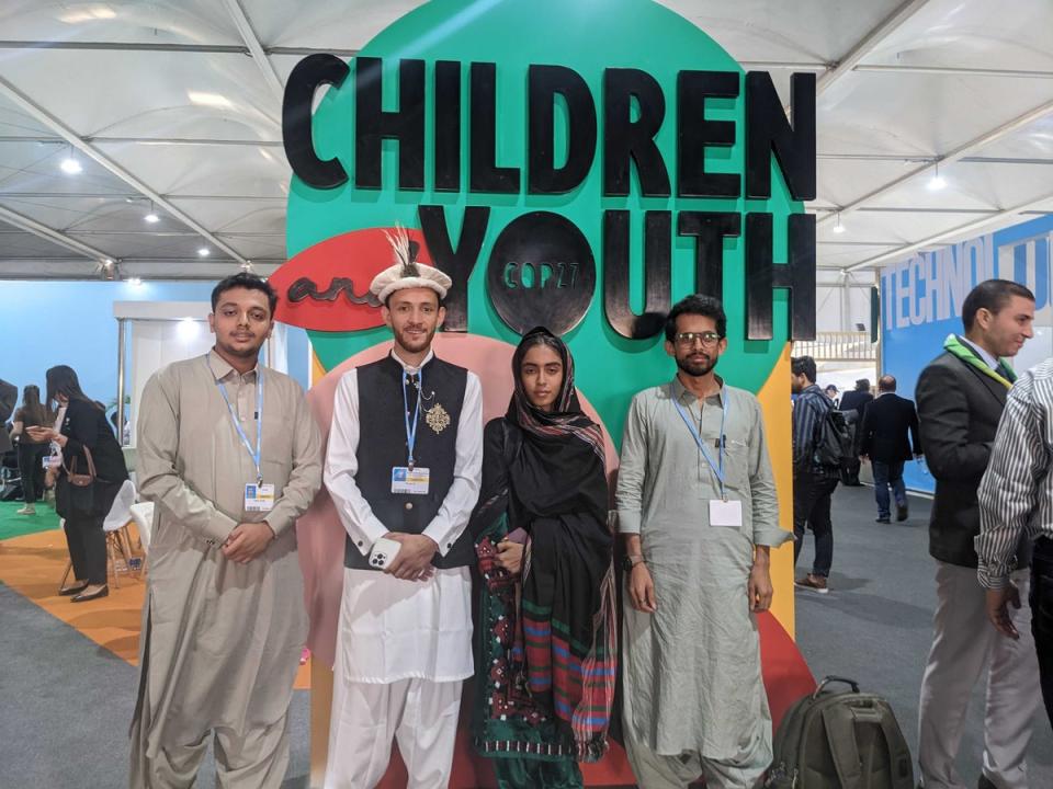 Flood survivors from Pakistan stand at the Youth and Children pavilion at Cop27 summit (Stuti Mishra/The Independent)